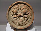 Dokkaebi pattern was shown Roof-end tile from Goguryeo dated to the fifth or sixth century. Roof-end tile from Goguryeo.jpg