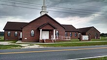 A church in The Oaks in 2014 Shiloh Baptist Church, Atlantic, VA, August 2014.jpg