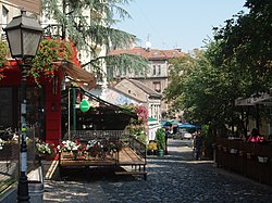 Bohemian quarter of Skadarlija. With its mix of old-style kafanas and modern clubs, it is the second most visited tourist attraction in Belgrade after the Belgrade Fortress Skadarlija - panoramio (1).jpg