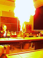 Lab demonstration with burning lycopodium powder Staubexplosion.jpg