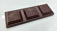 A TCHO plant-based dark chocolate bar TCHO Dark Duo chocolate bar.jpg