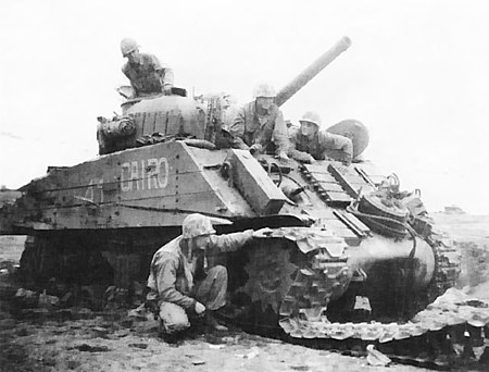 Tập_tin:Tank_disabled_by_a_land_mine.jpg