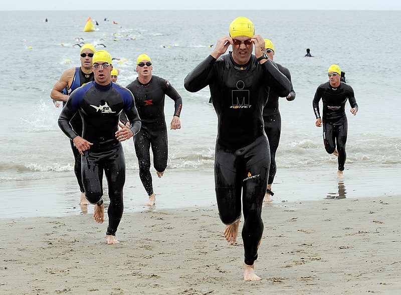 File:US Navy 090530-N-1722M-677 ompetitors in the men's division of the Armed Forces Triathlon exit the water to the transition area at Naval Base Ventura County.jpg