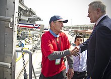 Ray Mabus greeting Baca in 2011 US Navy 111111-N-AC887-001 Secretary of the Navy (SECNAV) the Honorable Ray Mabus welcomes Congressional Medal of Honor recipient John P. Baca aboa.jpg