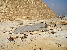 Remains of the basalt floor of the temple at the east foot of the pyramid Vestiges-temple-kheops.jpg