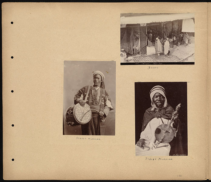 File:Views of shops and street musicians in Algeria.jpg