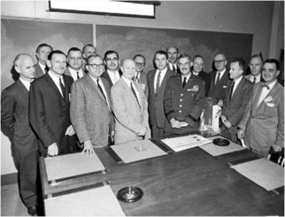 Wernher von Braun and his team in the fall of 1959. At the time, von Braun and his associates worked for the Army Ballistic Missile Agency in Huntsville, Alabama. Those in the photograph have been identified as Ernst Stuhlinger, Frederick von Saurma, Fritz Mueller, Hermann Weidner, Erich W. Neubert (partially hidden), William Mrazek, Karl Heimburg, Arthur Rudolph, Otto Hoberg, von Braun, Oswald Lange, General John Bruce Medaris, Helmut Hoelzer, Hans Maus, E.D. Geissler, Hans Hueter, and George Constan. VonBraunTeam1959.gif