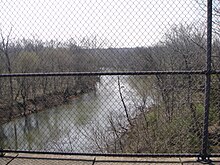 View of Goose Creek from the W&OD Trail in March 2012 W&OD Trail - A view of the Goose Creek from a bridge on the trail.JPG