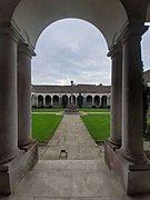 Winchester College War Cloister from eastern entrance.jpg