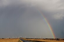 A rainbow covers a wind farm in Western Victoria Windfarm Rainbow.jpg