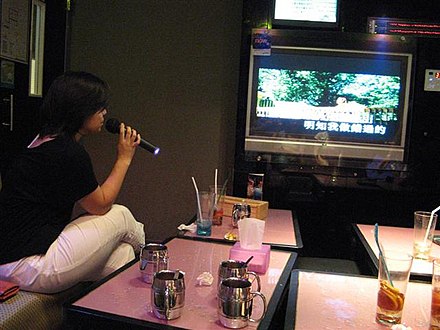 A person singing karaoke in Hong Kong
