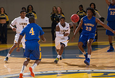 The Muleriders men's basketball team in action against the Texas A&M-Commerce Lions in 2013 13420-Basketball vs Southern Arkansas-6754 (10858161123).jpg