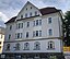 Tenement house from 1912 in German reform style architecture (Reformarchitektur). The inscription on the stone near the right edge of the image reads:...