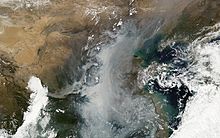 A blanket of smog covering northeast China, home to most of Chinese industrialization. 2010 Smog over China.jpg