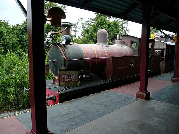 A deliberately distressed steam outline diesel locomotive built in 1997 for the Wildlife Express Train at Disney World.
