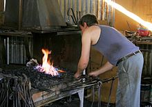 A blacksmith at work Australian blacksmith.jpg