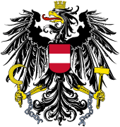 Bundesadler de la República de Austria desde 1945; el mismo diseño, con la hoz y el martillo y las cadenas rotas que simbolizan el fin del comunismo, se utilizó entre 1919 y 1934 y actualmente.