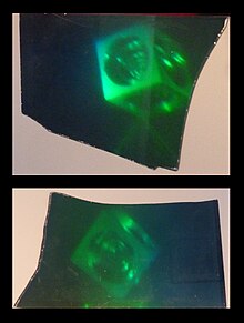 Reconstructions from two parts of a broken hologram. Note the different viewpoints required to see the whole object Broken hologram.jpg