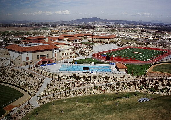 An aerial shot of CCHS's athletic facilities (2005). In the far bottom left is part of right field of the baseball diamond. At the bottom is the multi