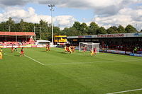 Crawley Town playing against Yeovil Town in September 2015. Crawley became the second team in Sussex to join the Football League in 2011 Crawley Town defend a Yeovil Town corner (geograph 4667582).jpg