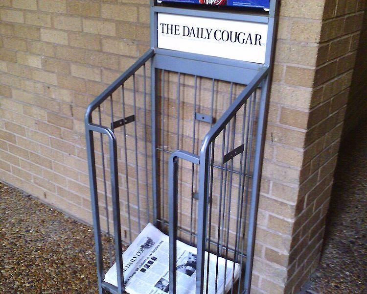File:Daily Cougar distribution stand.jpg