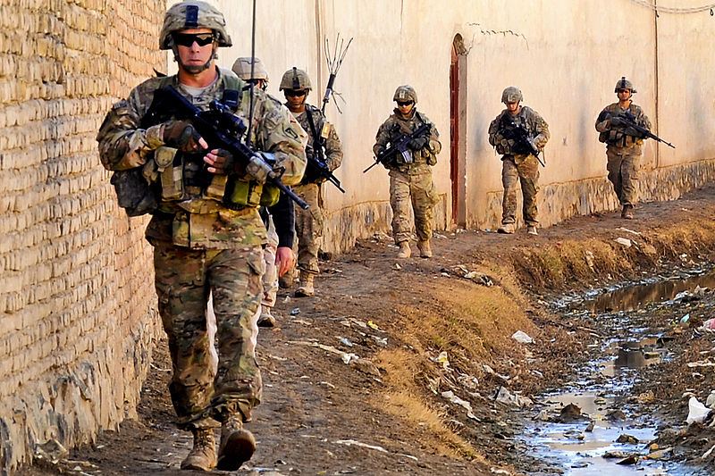 File:Defense.gov News Photo 120128-F-SA682-088 - U.S. troops walk to the Department of Public Works facility and a water distribution point to inspect a project in Kandahar province Afghanistan.jpg