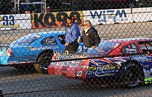 Trickle (right) at the 2009 Dick Trickle 99 DickTrickleWalkingLaCrosseSpeedway2009.jpg