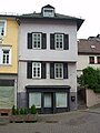 Three-storey half-timbered building