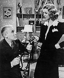 Farrell in the 1938 film Exposed with Charles D. Brown