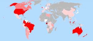 World map showing countries in gray, white and in various shades of red. The U.S. and Australia stand out as bright red (which the caption identifies as the 60–80% color). Brazil and Canada are medium pink (40–60%). China, much of western Europe, and central Africa are light pink (1–20%). Germany, Japan, Nigeria, and Venezuela are white (<1%).