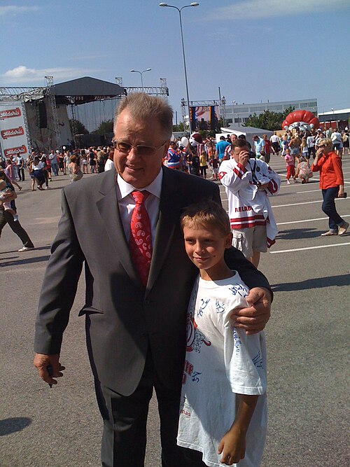 Guntis Ulmanis with young Dinamo Riga fan in 2013