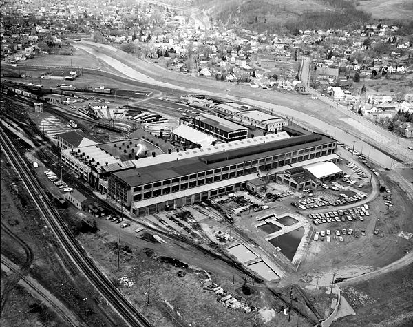 Former Erie Railway repair shop in Hornell. View is looking north towards downtown Hornell. Note the rotating train turntable and the Canisteo River. 