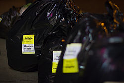 Waste on a sidewalk for collection, bagged and stickered - in Dublin, Ireland Ireland Victor Grigas 2011-15.jpg