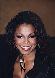 Jackson (pictured in 2002) was dubbed "Queen of Radio" after "All for You" was added to every pop, rhythmic, and urban radio format in its first week. Janet Jackson 2002.jpg