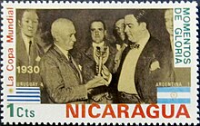 Jules Rimet presents the World Cup trophy to Raul Jude, president of the Uruguayan Football Association, winners of the inaugural 1930 FIFA World Cup. This trophy was renamed for Rimet in 1946. Jules Rimet presents 1930 FIFA Cup to Raul Jude 1974 stamp of Nicaragua.jpg