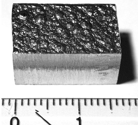 A block of electrolytically refined cobalt (99.9% purity) cut from a large plate