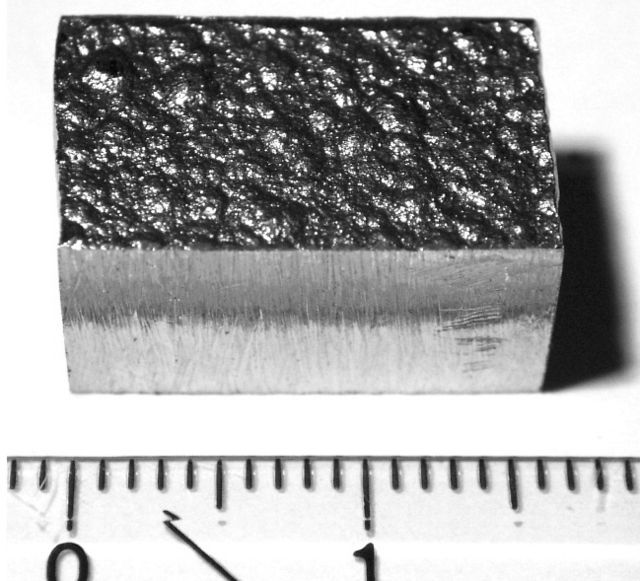 A block of electrolytically refined cobalt (99.9% purity) cut from a large plate