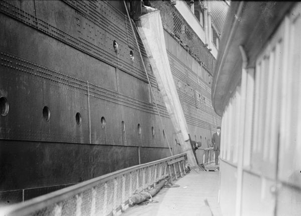 Lusitania unloading Christmas mail to a post office boat