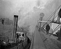 Man walking on the deck of a ship (3796293648).jpg