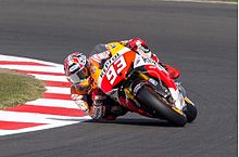 Marc Marquez, elbow down at the 2013 British Grand Prix Marc Marquez 2013.jpg