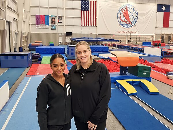 Mélanie with her coach Cécile Landi at her gym WCC in 2024.