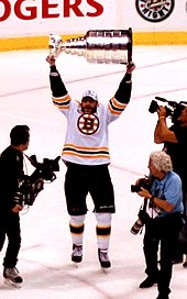 Milan Lucic with the Stanley Cup after the Bruins defeated the Vancouver Canucks in Game 7 of the 2011 Stanley Cup Finals. Milan Lucic Stanley Cup celebration.jpg