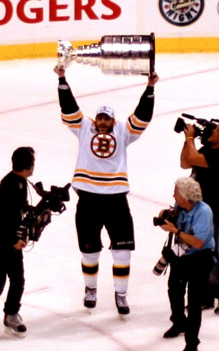 Milan Lucic hoists the Stanley Cup after Game seven