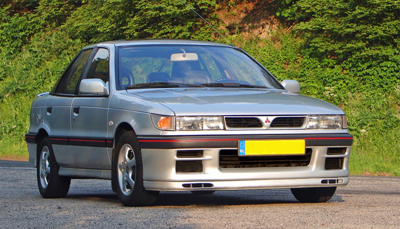 Lancer 1988. Mitsubishi Lancer GTI. Мицубиси Мираж GTI. Mitsubishi Lancer GTI STW. Lancer 1988 Tuning.