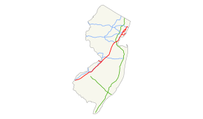 Map of New Jersey with a long red line running from the southwest corner of the state to the northeast corner of the state signifying the mainline, three short red lines signifying the spur routes