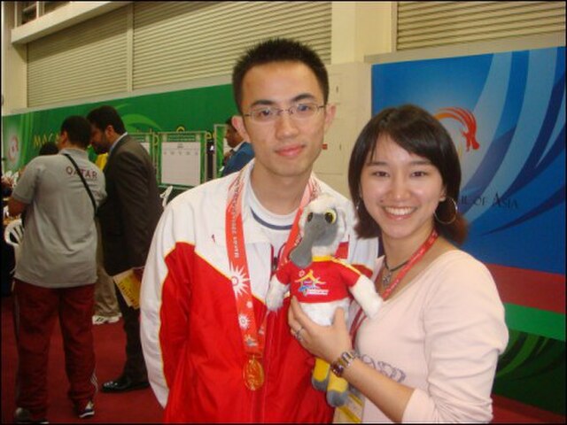 Ni Hua (left) at the Macau 2nd Asian Indoor Games