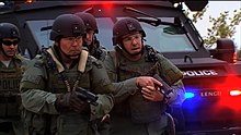 OCPD Tact Team deploying from a BearCat in a training exercise Oklahoma City Police Tact Team.jpeg