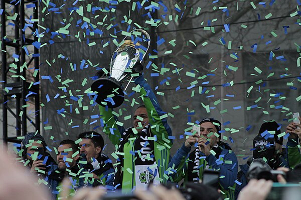 Osvaldo Alonso of Seattle Sounders FC lifting the MLS Cup trophy in December 2016