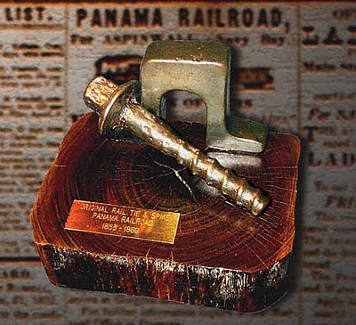 Example of the original construction 53 lb/yd (26 kg/m) inverted "U" rail aka "Bridge" rail, "screw" spike, and lignum vitae tie used to build the Panama Railroad from 1851 to 1855.