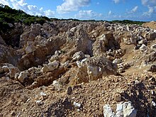 Phosphate quarry on Christmas Island Phosphate Rock (25509053072).jpg